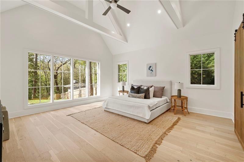 1074 Moores Mill Road Northwest Atlanta, GA 30327 - Photo 29 of 68 a living room with furniture and a large window