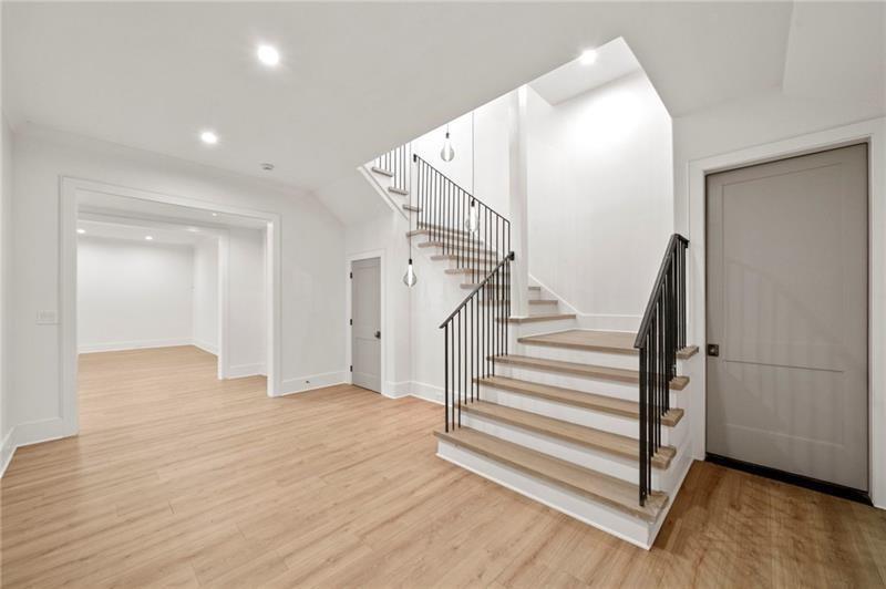 1074 Moores Mill Road Northwest Atlanta, GA 30327 - Photo 37 of 68 a view of entryway with wooden floor
