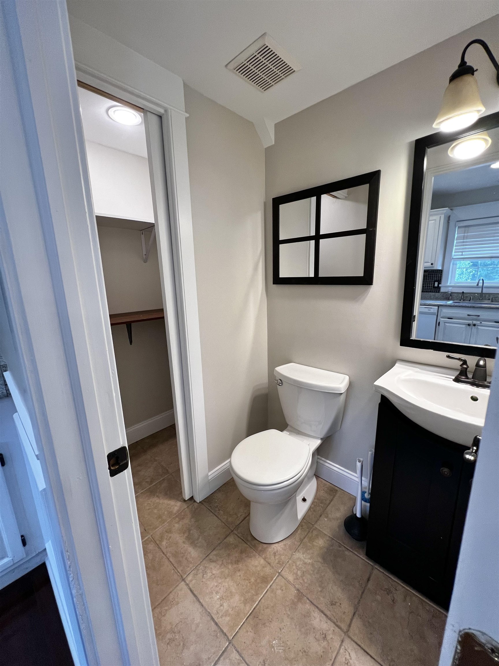 28 New Bridge Road Seaville, NJ 08230 - Photo 14 of 29 a bathroom with a toilet sink and mirror
