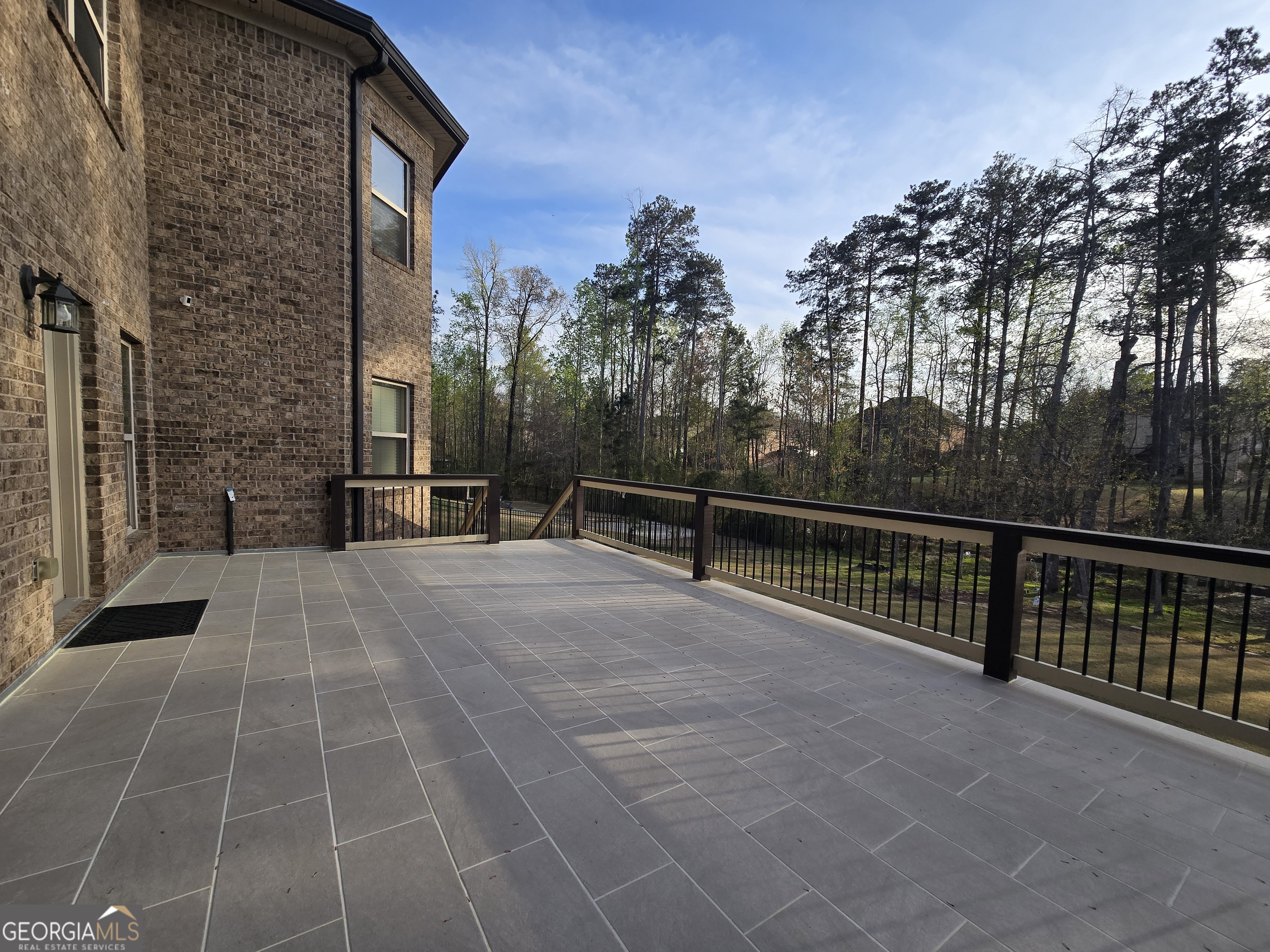 376 Masters Club Boulevard Hampton, GA 30228 - Photo 49 of 68 a view of a terrace with trees