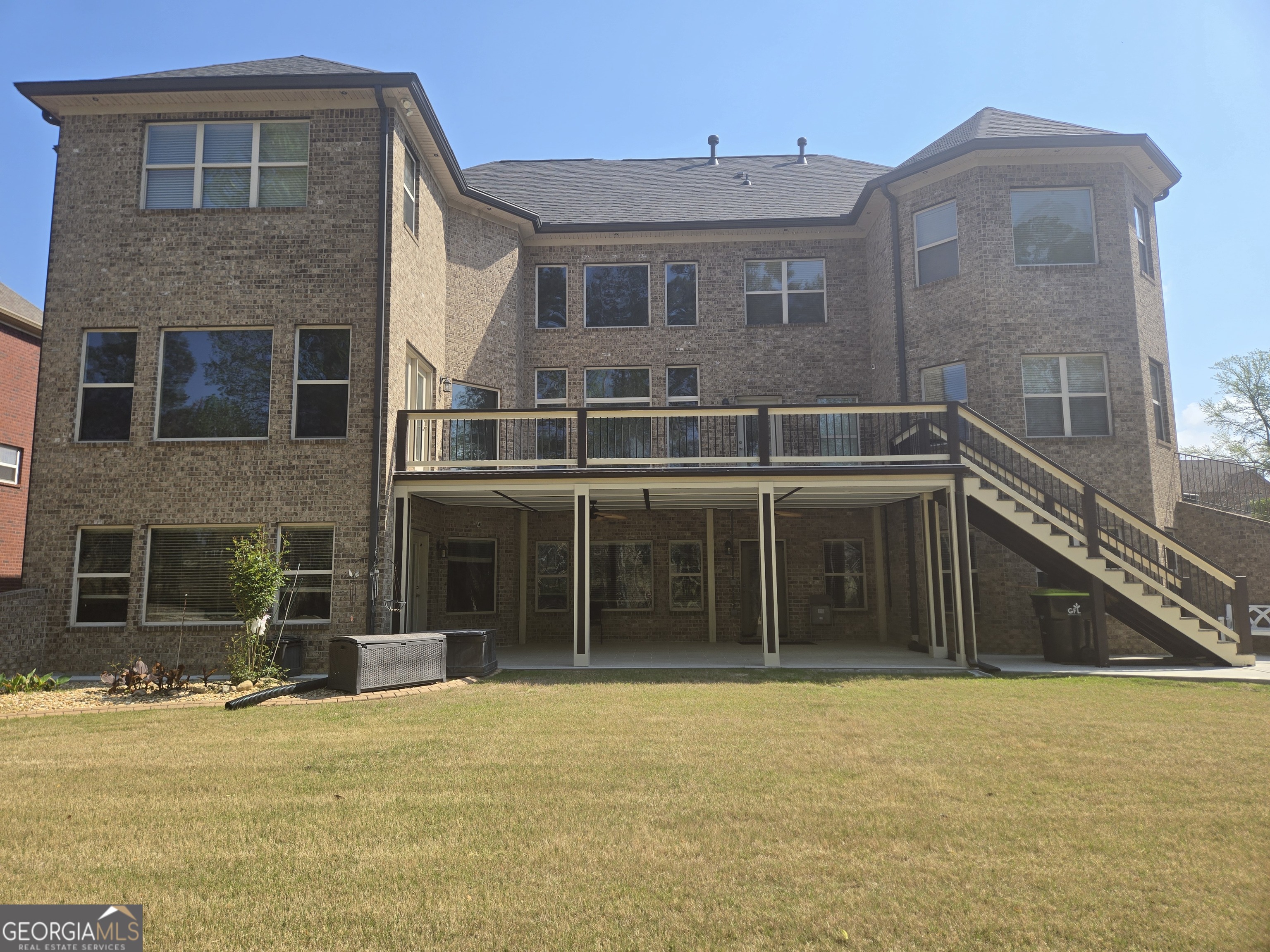 376 Masters Club Boulevard Hampton, GA 30228 - Photo 60 of 68 a view of a brick house with a large windows
