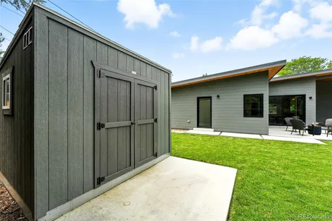 a view of a backyard with a garden