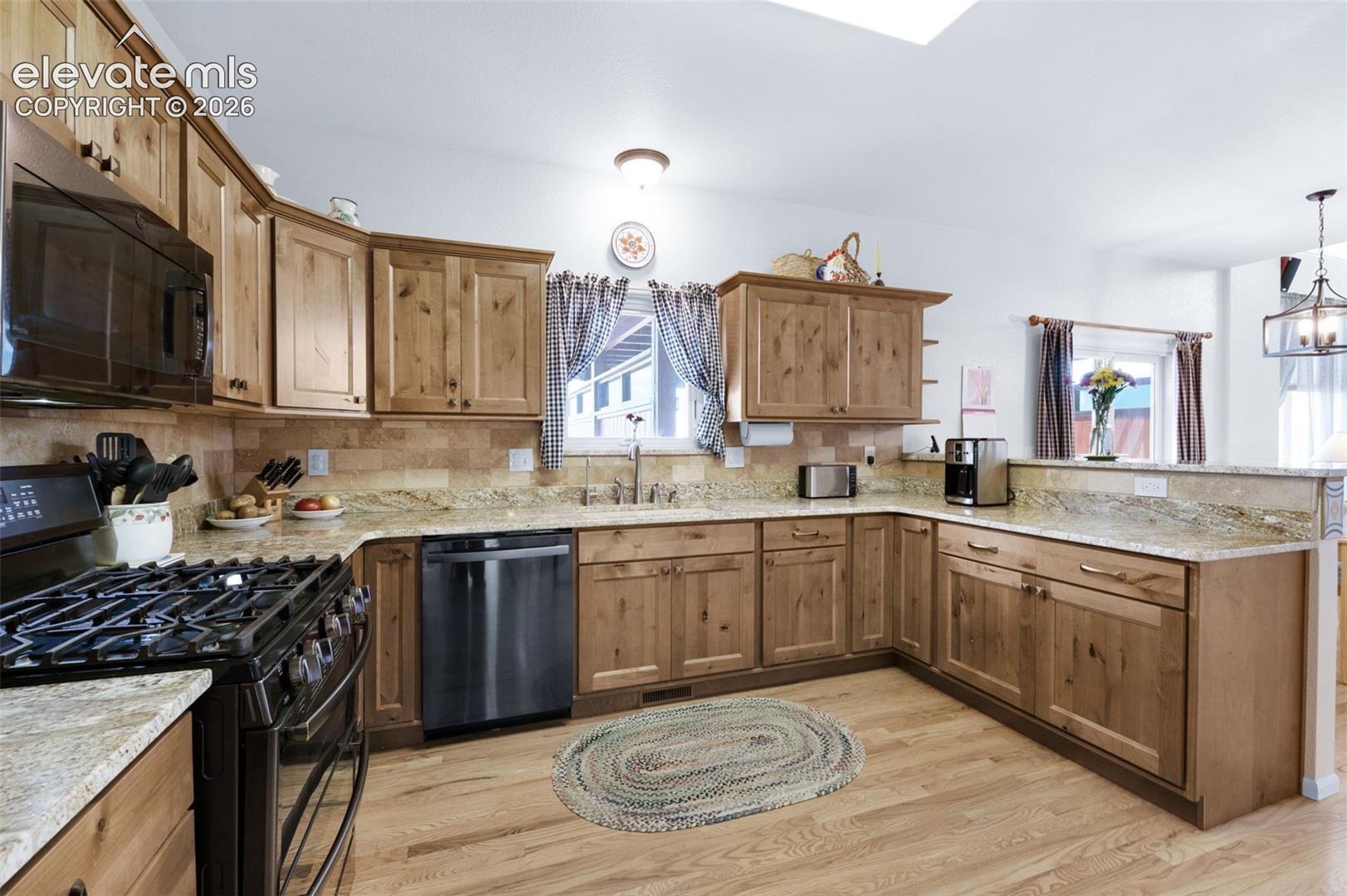 8965 Theriot Road Peyton, CO 80831 - Photo 6 of 50 Expansive Granite Counters