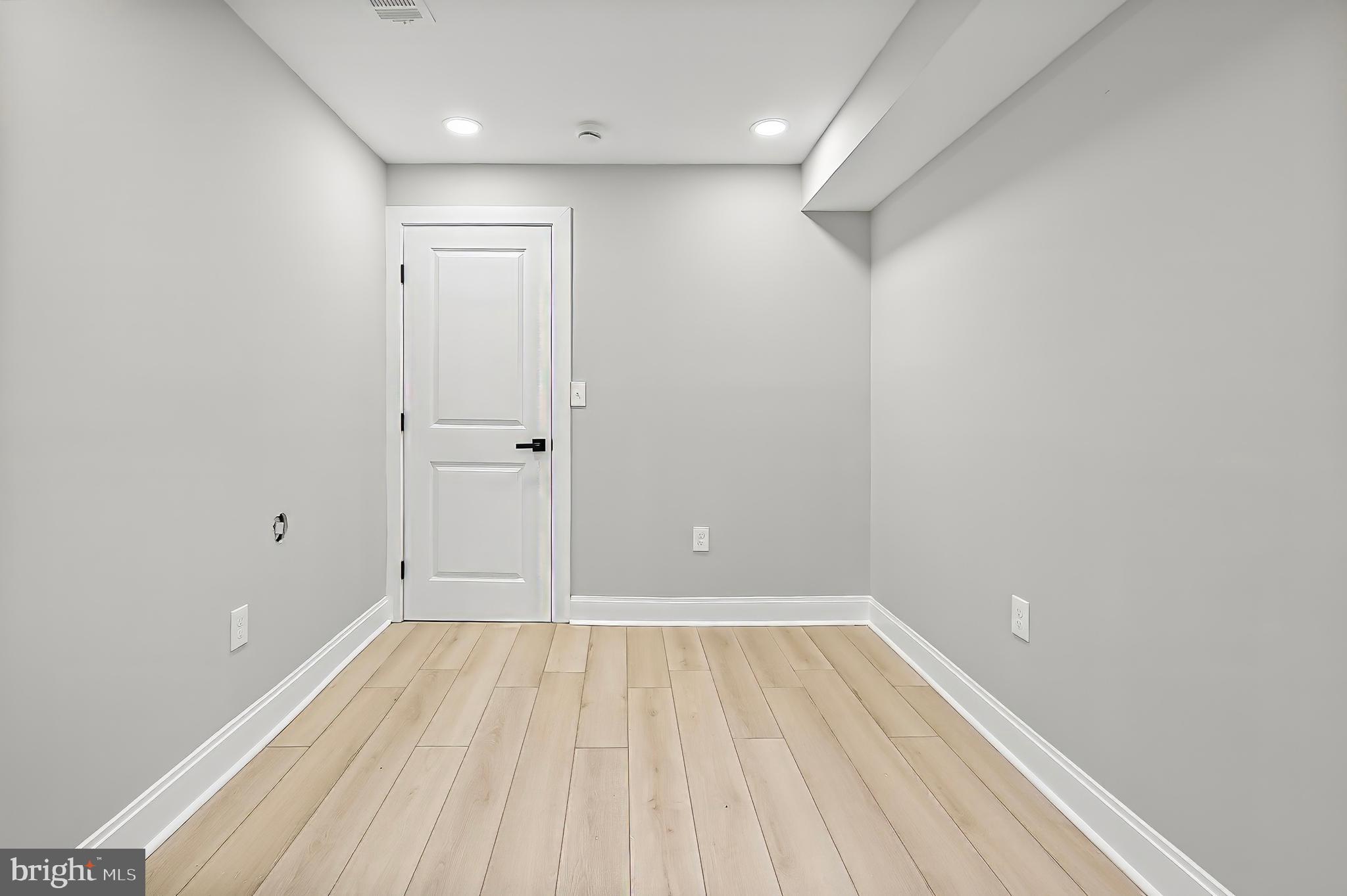 539 East 23rd Street Baltimore, MD 21218 - Photo 19 of 29 a view of a room with wooden floor