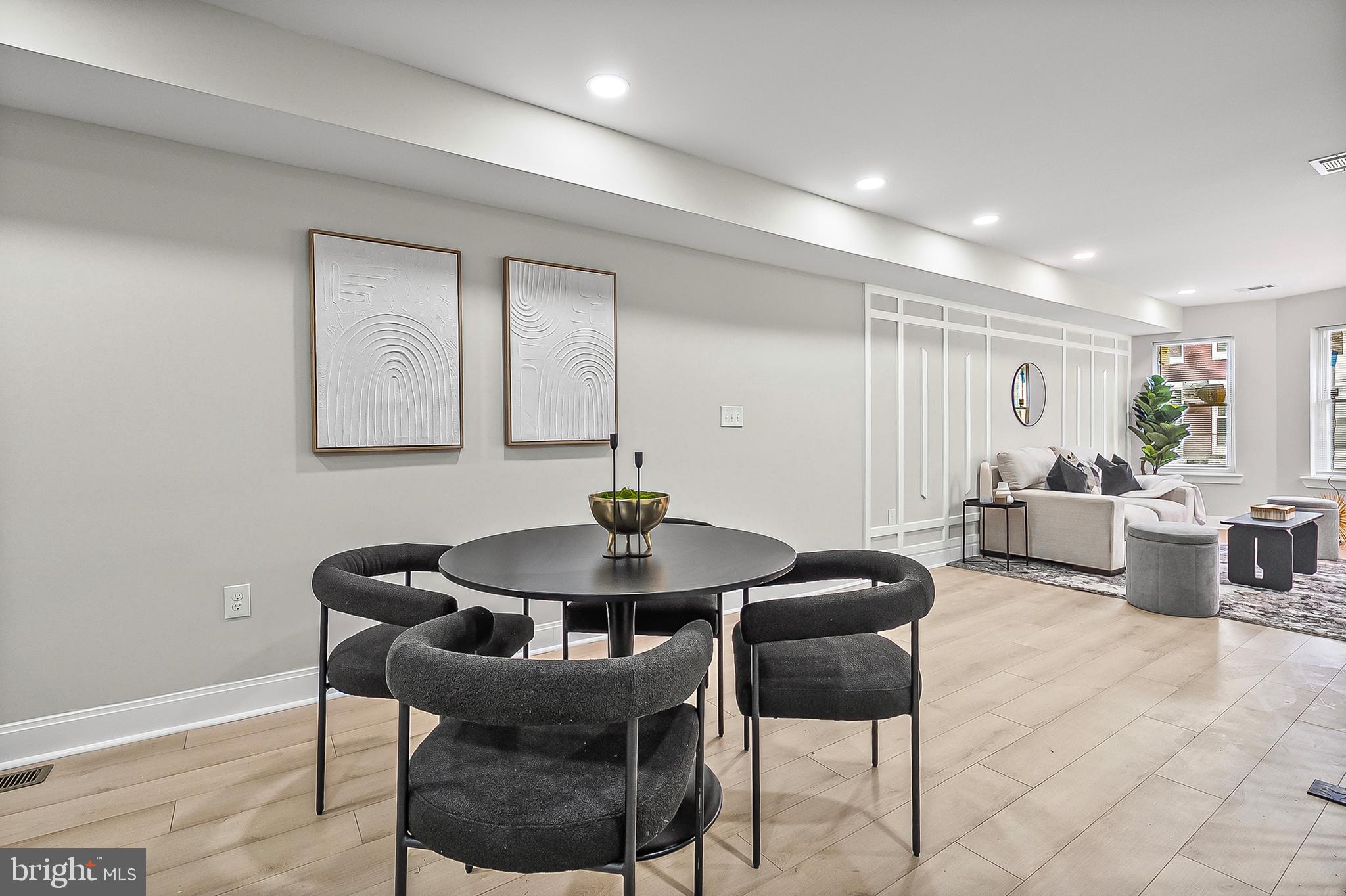 539 East 23rd Street Baltimore, MD 21218 - Photo 5 of 29 a view of a dining room with furniture and wooden floor