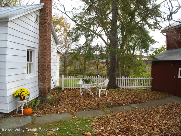 a view of a back yard and patio