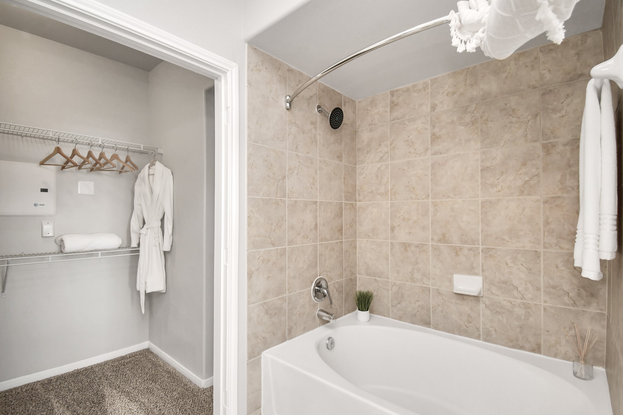 6777 Sommerall Drive, Unit 1636 Houston, TX 77084 - Photo 34 of 39 a bathroom with a white bath tub and shower