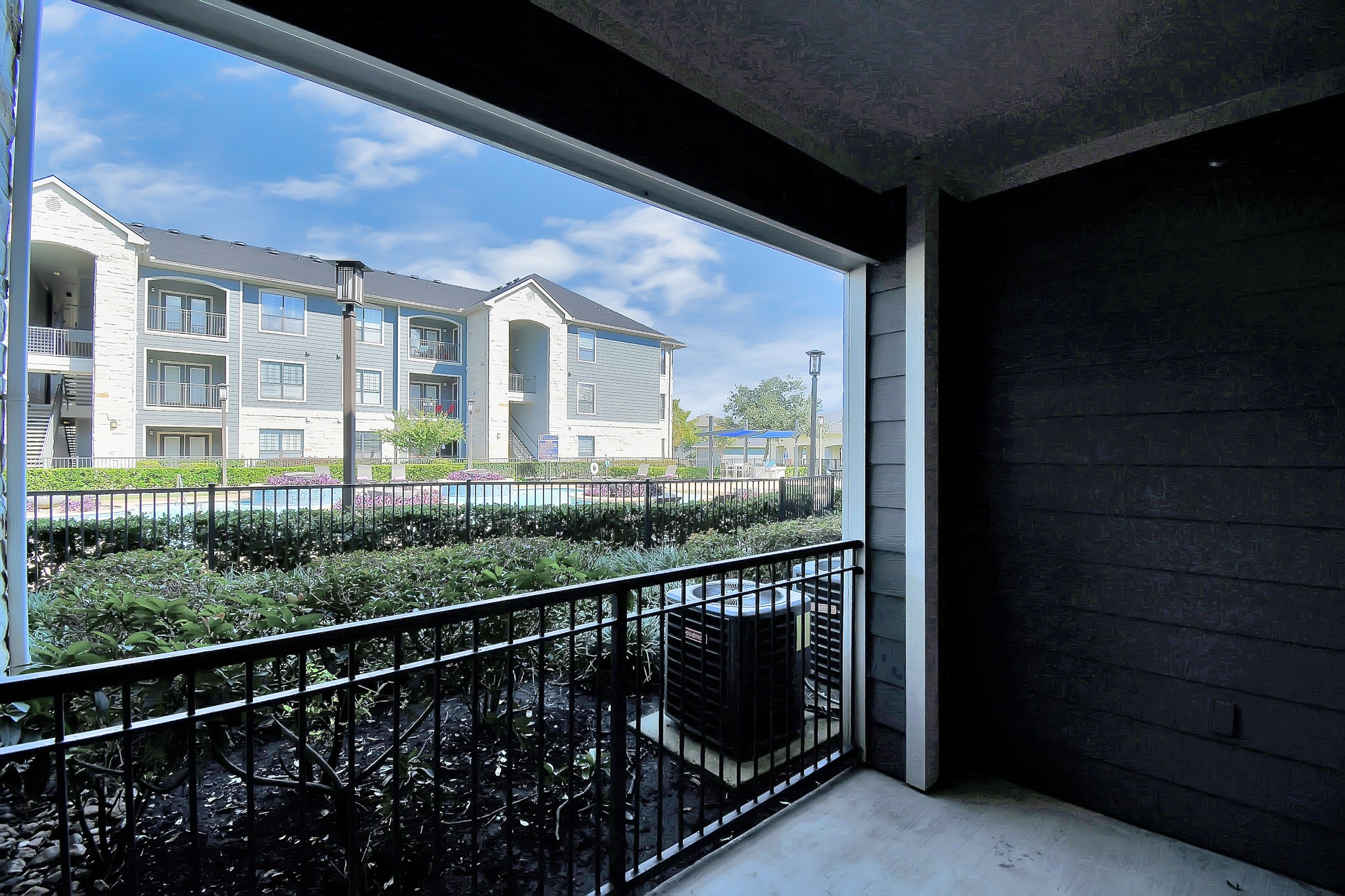 6777 Sommerall Drive, Unit 1636 Houston, TX 77084 - Photo 38 of 39 a view of a balcony with outdoor space