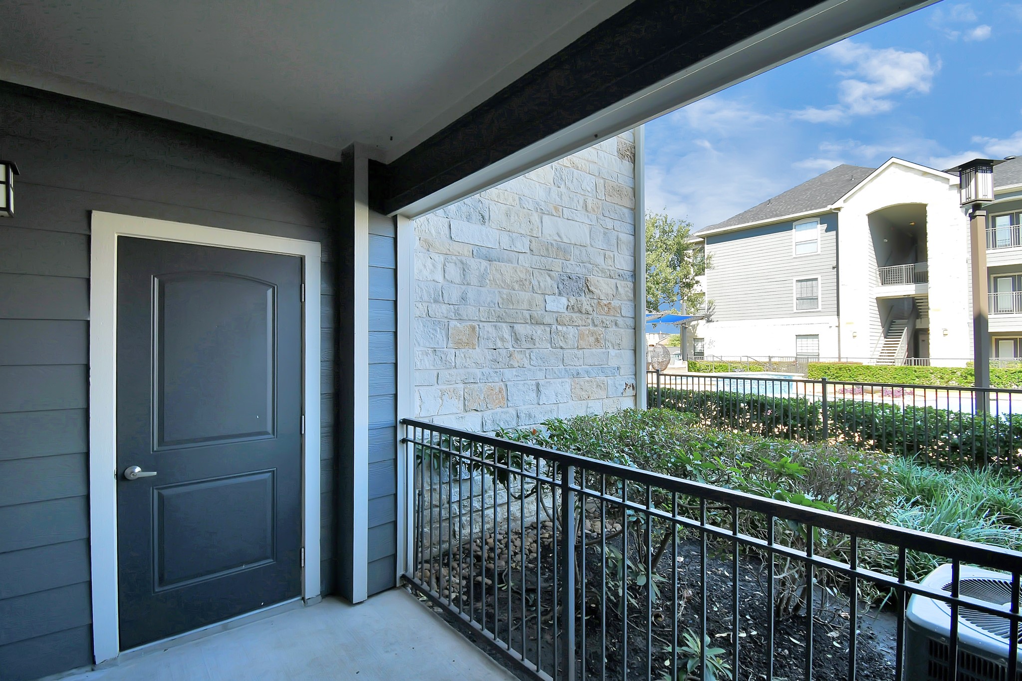 6777 Sommerall Drive, Unit 1636 Houston, TX 77084 - Photo 39 of 39 a view of a building from a balcony