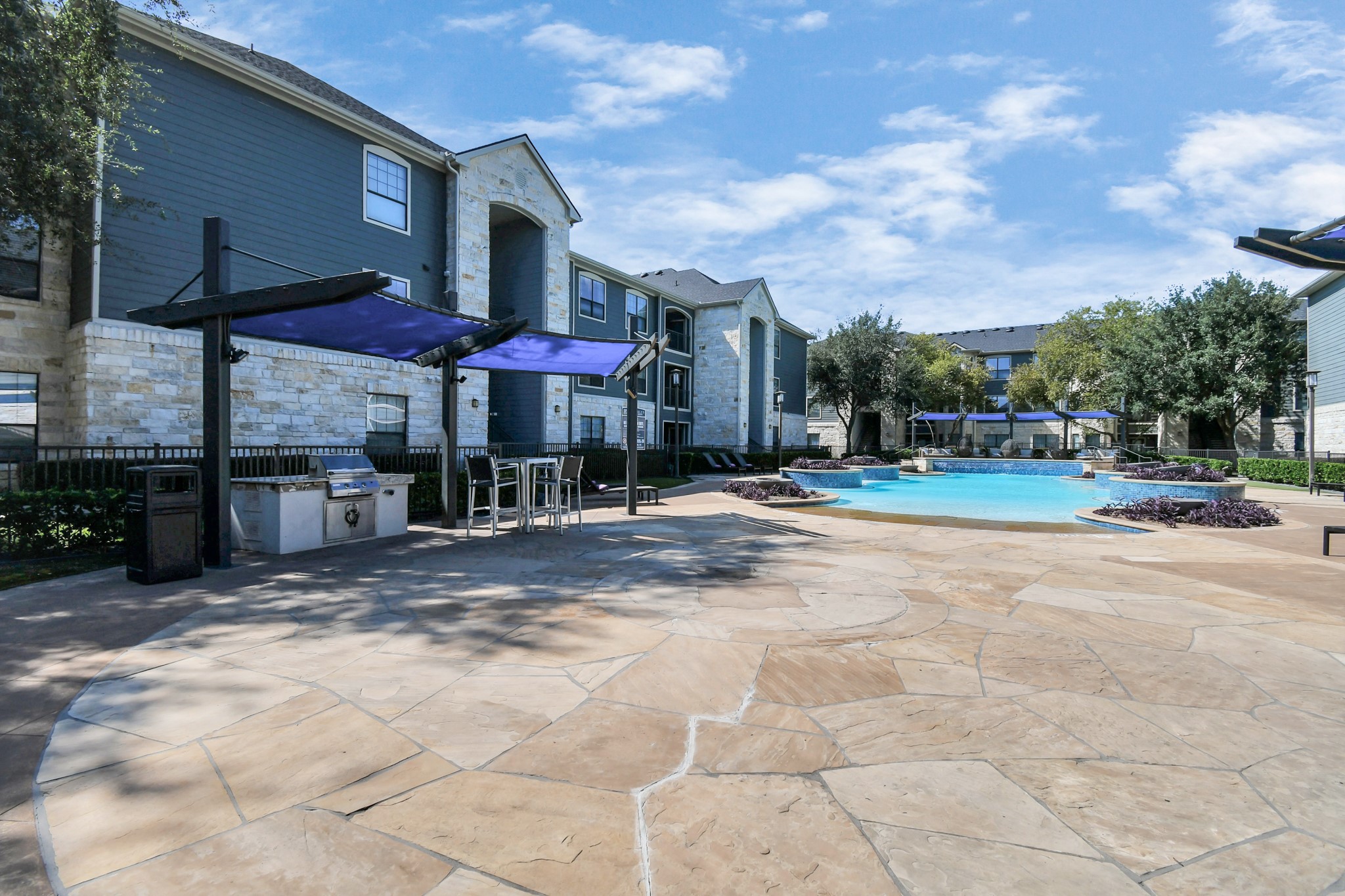 6777 Sommerall Drive, Unit 1636 Houston, TX 77084 - Photo 3 of 39 a view of a building with sitting area