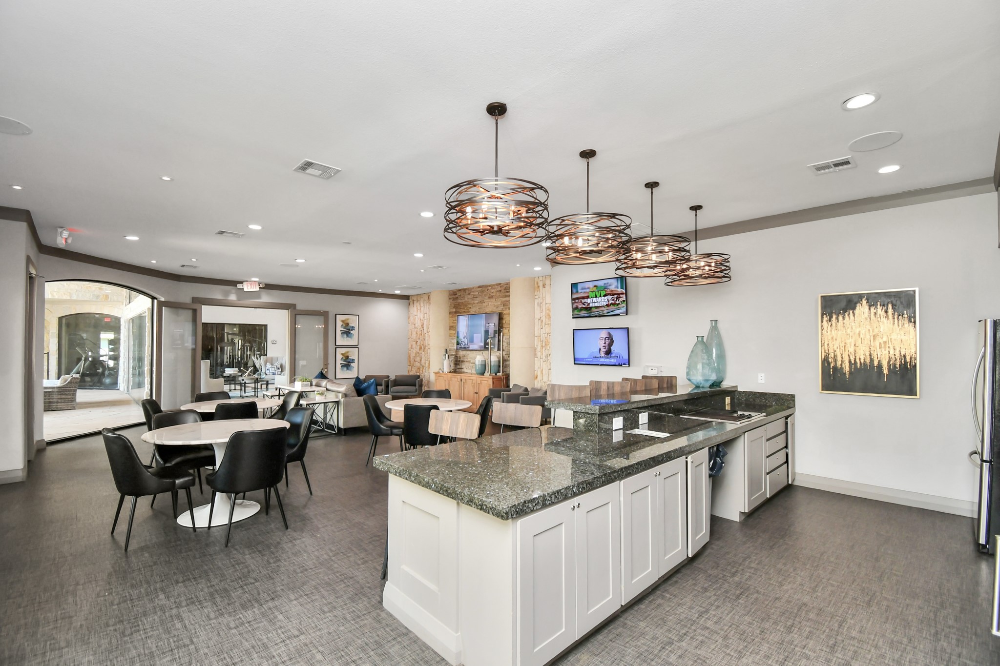 6777 Sommerall Drive, Unit 1636 Houston, TX 77084 - Photo 19 of 39 a kitchen with stainless steel appliances granite countertop a sink and a refrigerator