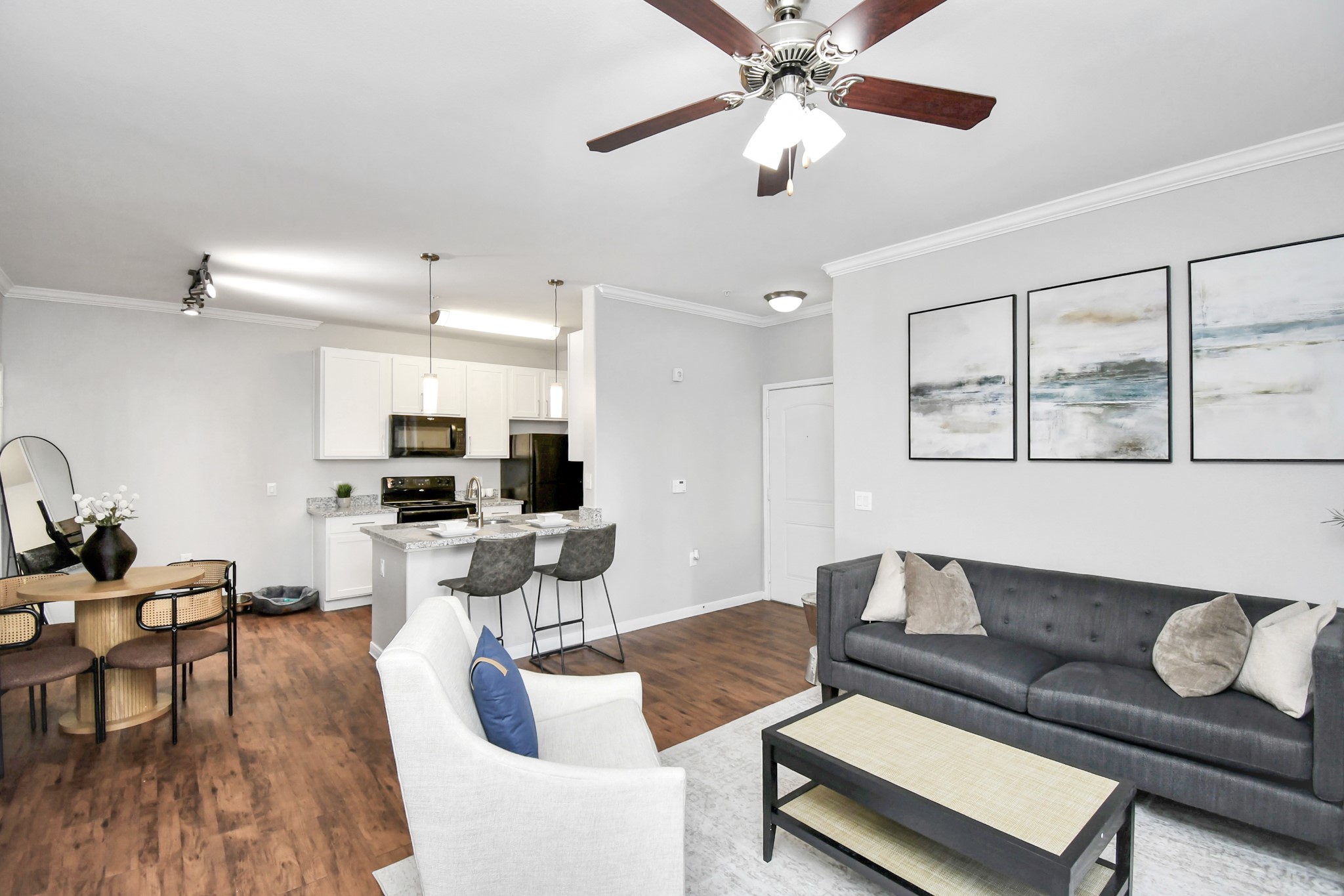6777 Sommerall Drive, Unit 1636 Houston, TX 77084 - Photo 22 of 39 a living room with furniture and a view of kitchen
