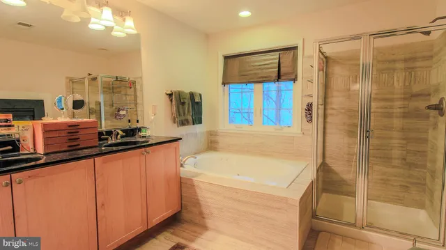 a kitchen with a sink a counter top space and appliances