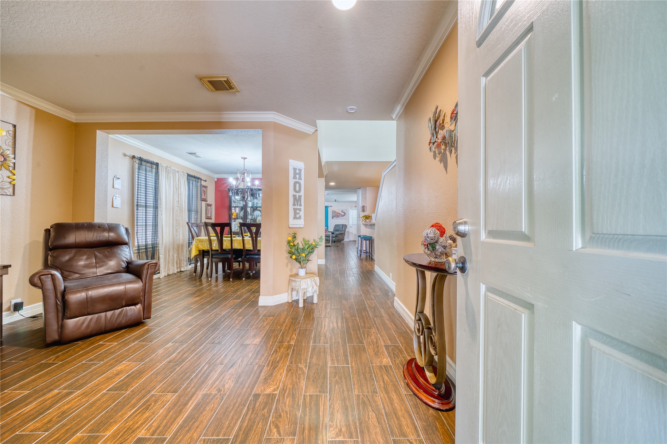2210 Mountain Ranch Drive Houston, TX 77049 - Photo 8 of 36 a living room with furniture and a wooden floor