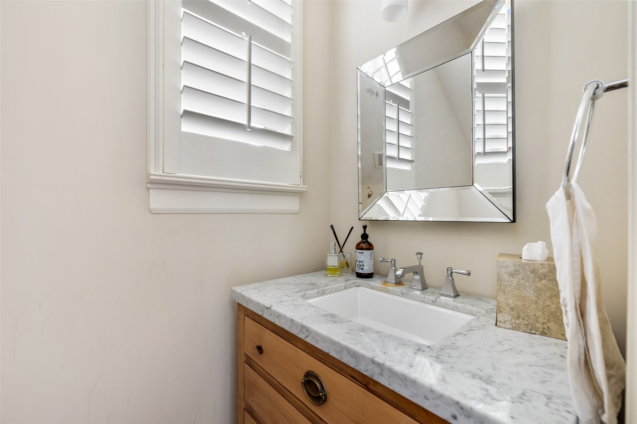 1202 Wynden Commons Lane Houston, TX 77056 - Photo 16 of 43 a bathroom with a granite countertop sink and a mirror