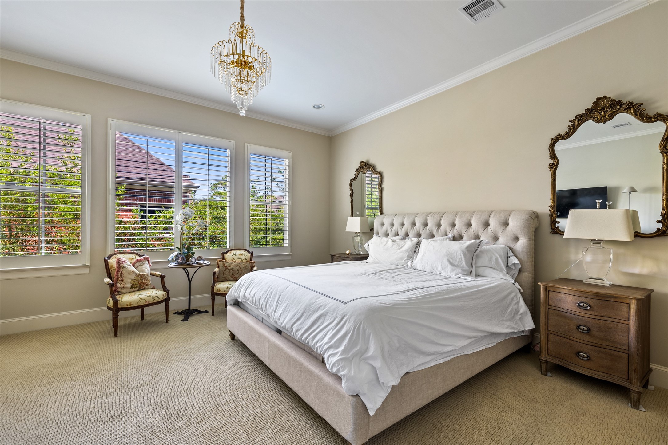 1202 Wynden Commons Lane Houston, TX 77056 - Photo 18 of 43 a bedroom with a bed and a couch