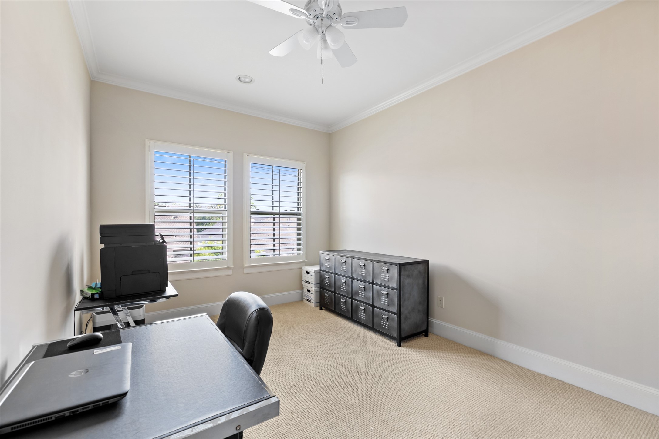 1202 Wynden Commons Lane Houston, TX 77056 - Photo 34 of 43 a view of workspace with furniture and window