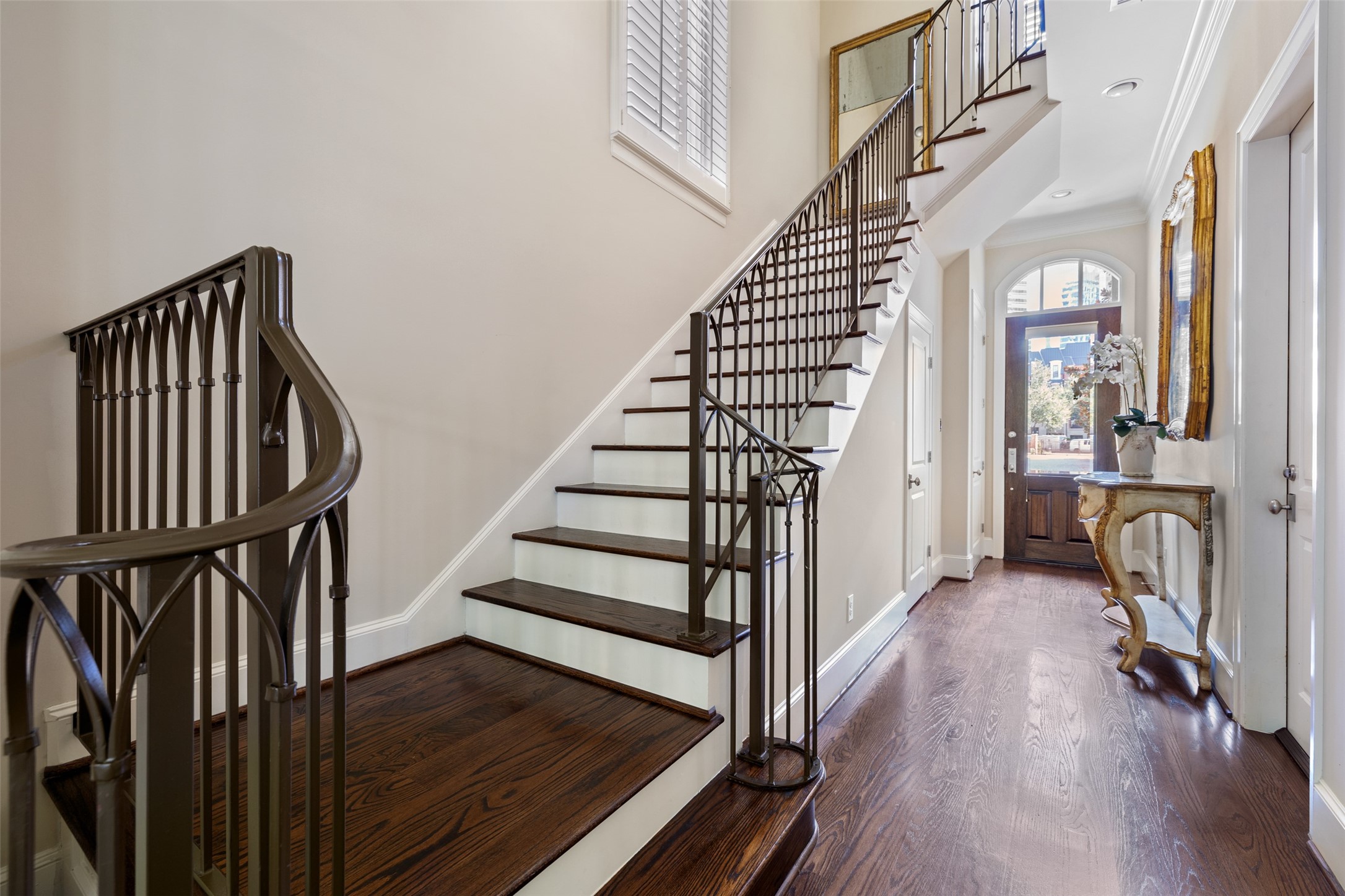 1202 Wynden Commons Lane Houston, TX 77056 - Photo 5 of 43 a view of an entryway with wooden floor and stairs