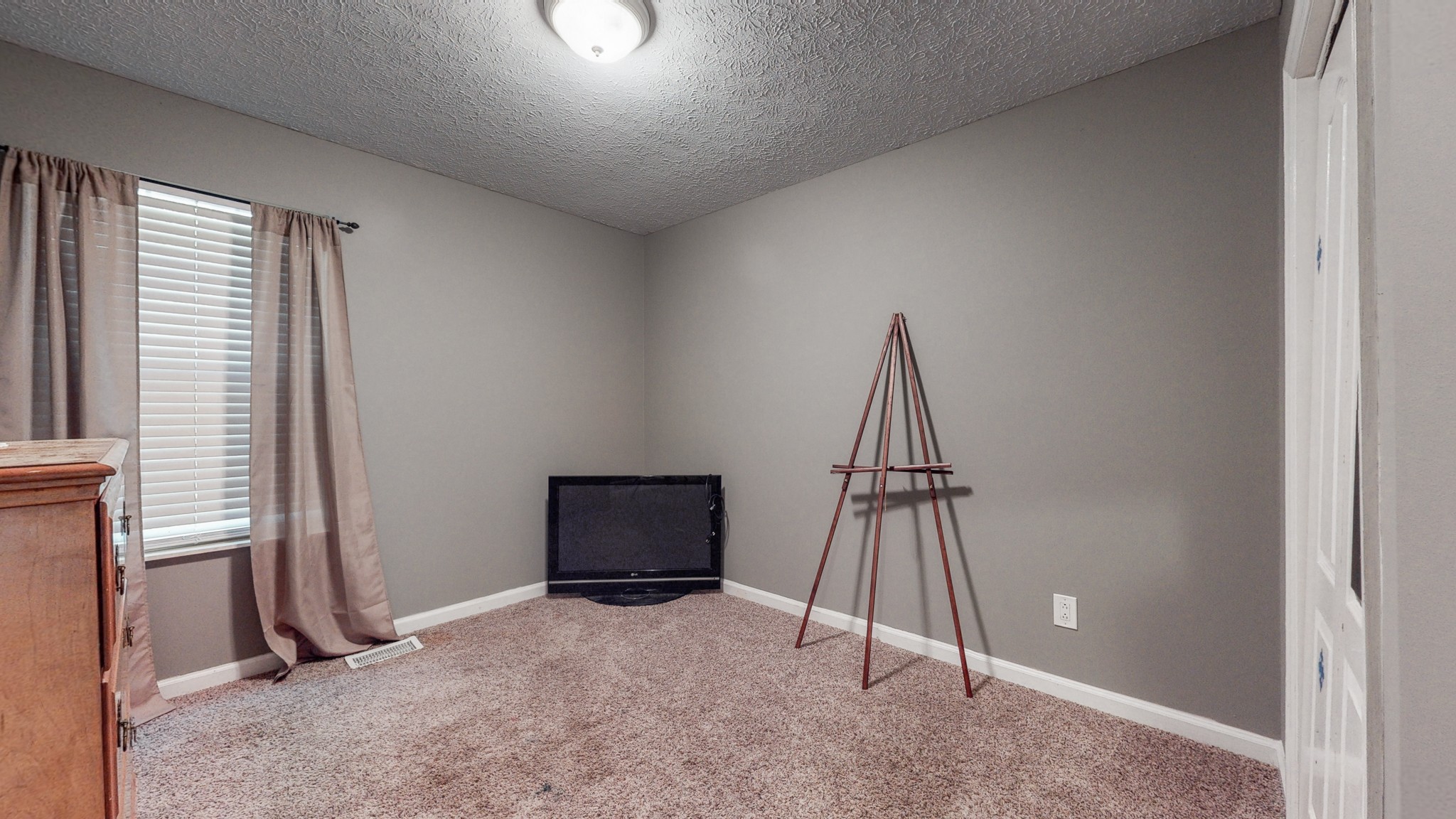 1081 Meeks Cemetery Road Burns, TN 37029 - Photo 23 of 45 a view of an empty room with a window