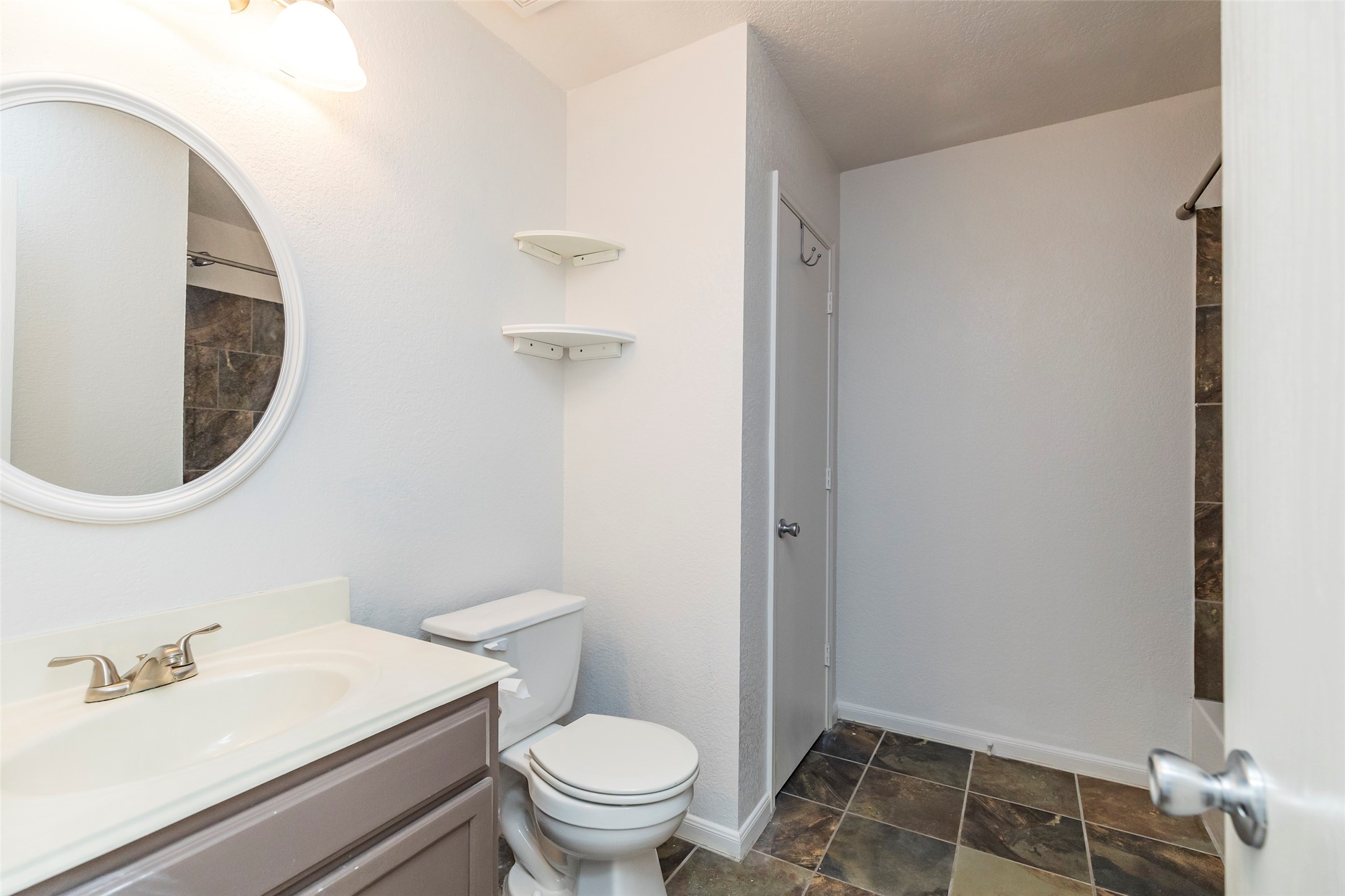 21202 Fire Wind Court Spring, TX 77379 - Photo 15 of 21 Full Bathrooms. Clean and functional bathrooms with modern fixtures.