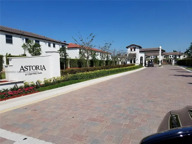 a view of a building with a street