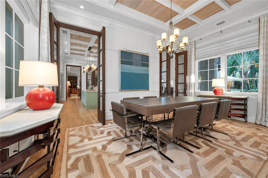 2284 Crayton Road Naples, FL 34103 - Photo 5 of 34 a view of a dining room with furniture window and outside view