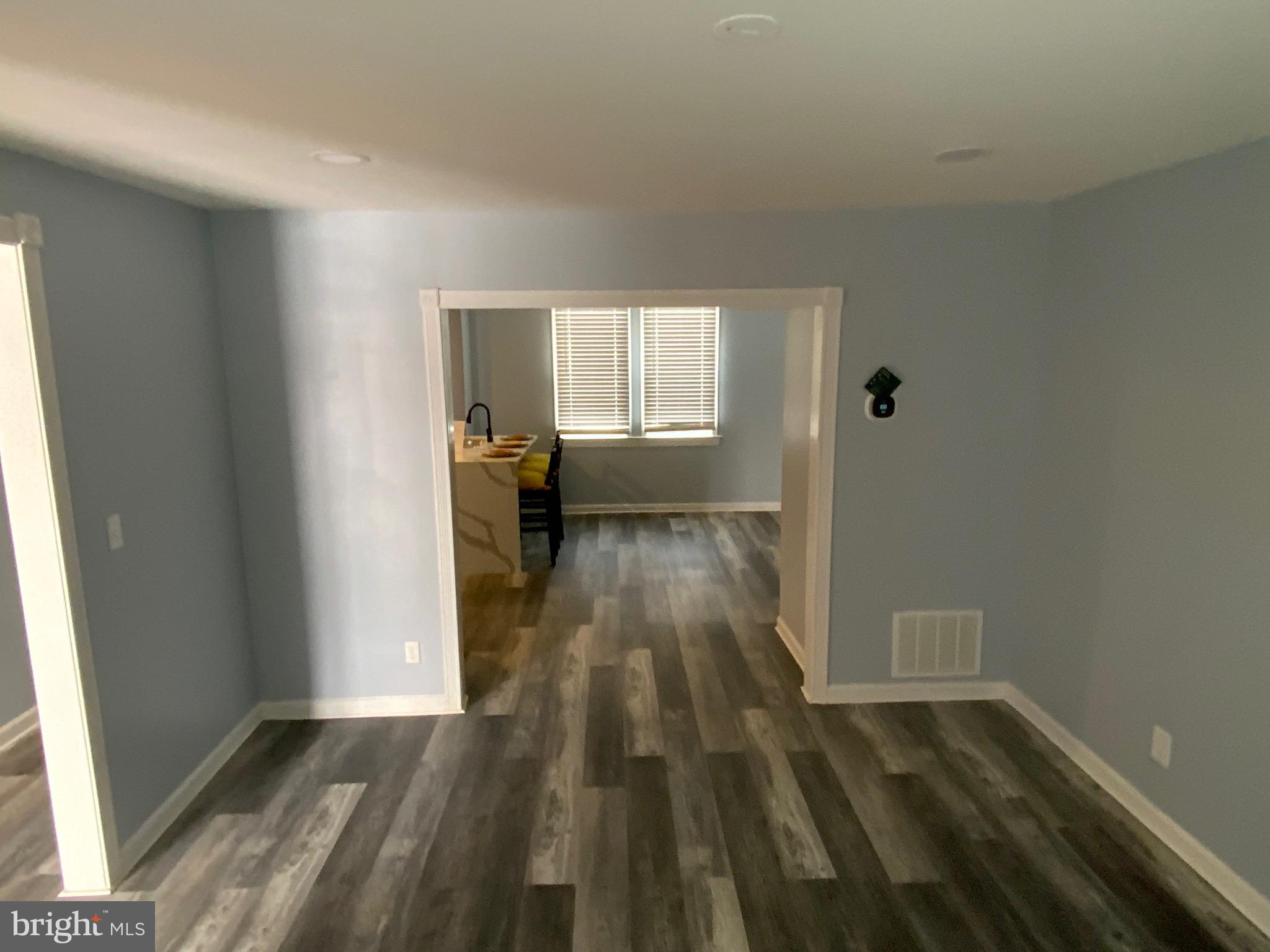3032 Hanlon Avenue Baltimore, MD 21216 - Photo 3 of 21 View of Living Room into Dining Room
