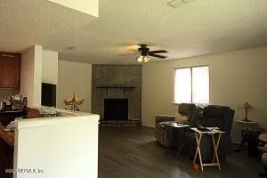 a view of a workspace with furniture