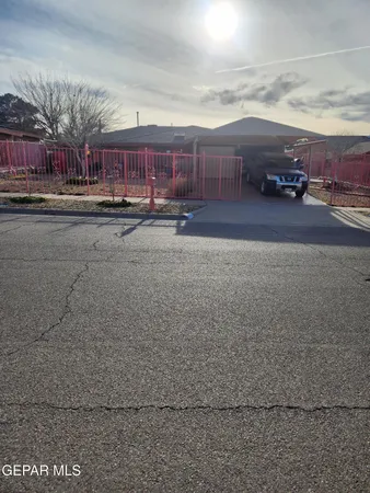 a view of parking area and car parked