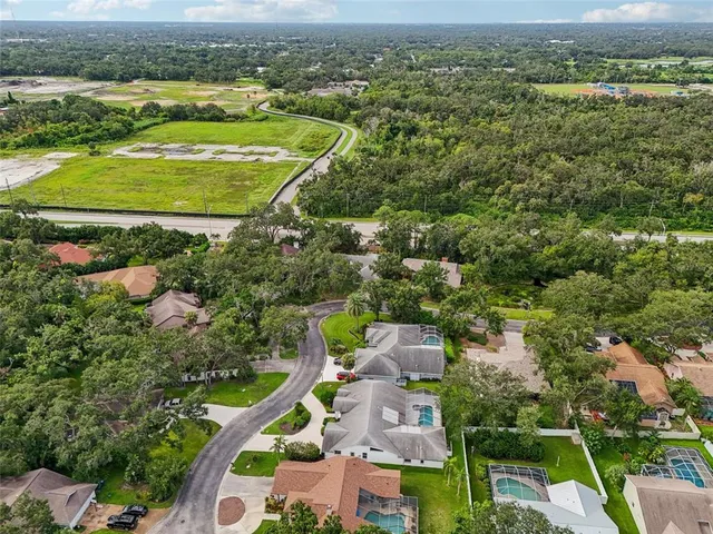 an aerial view of a house with a garden