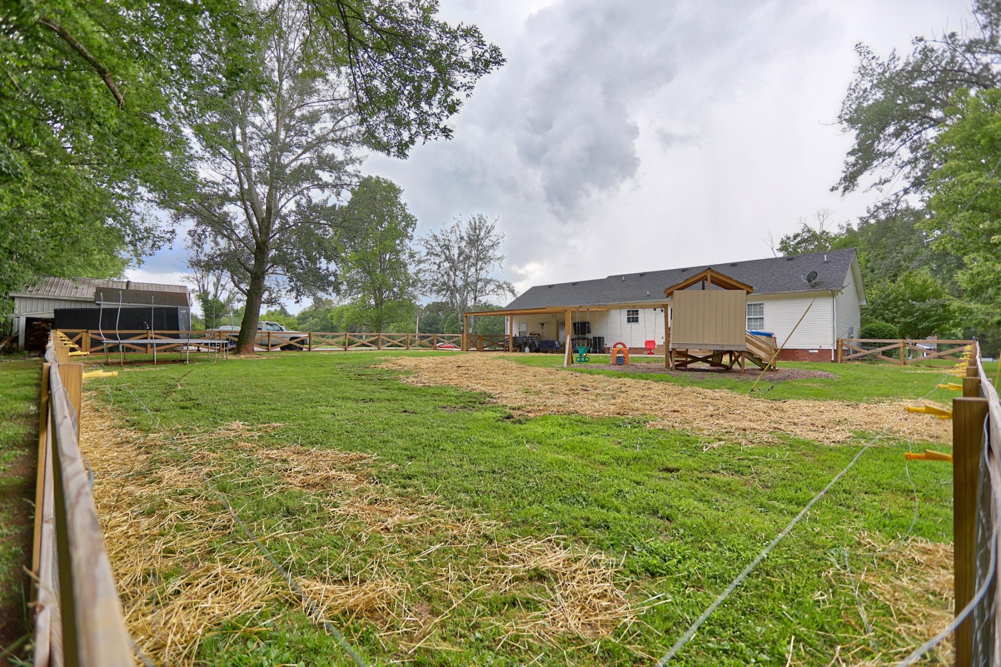 153 Clearview Road Cottontown, TN 37048 - Photo 3 of 39 a front view of a house with garden