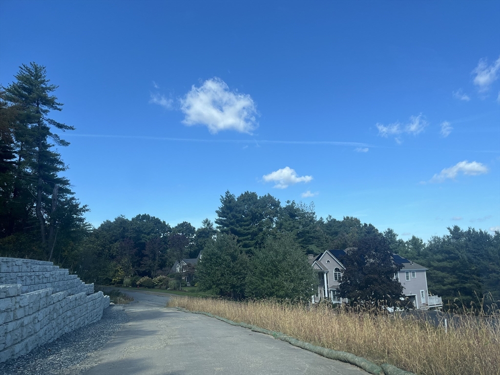 45 Widow Rites Lane Sudbury, MA 01776 - Photo 13 of 19 a view of a lake with a mountain in the background