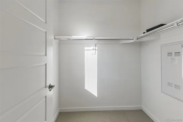 a view of an empty walk in closet