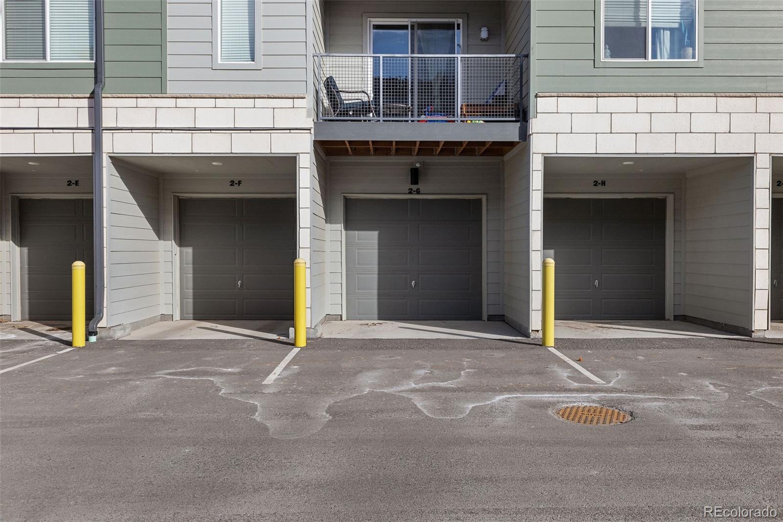 9287 Twenty Mile Road, Unit 401 Parker, CO 80134 - Photo 27 of 44 a view of a car garage of the building