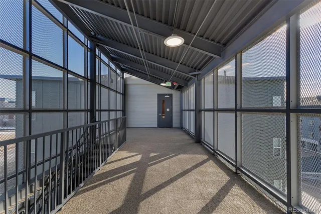 a view of a big house with a yard