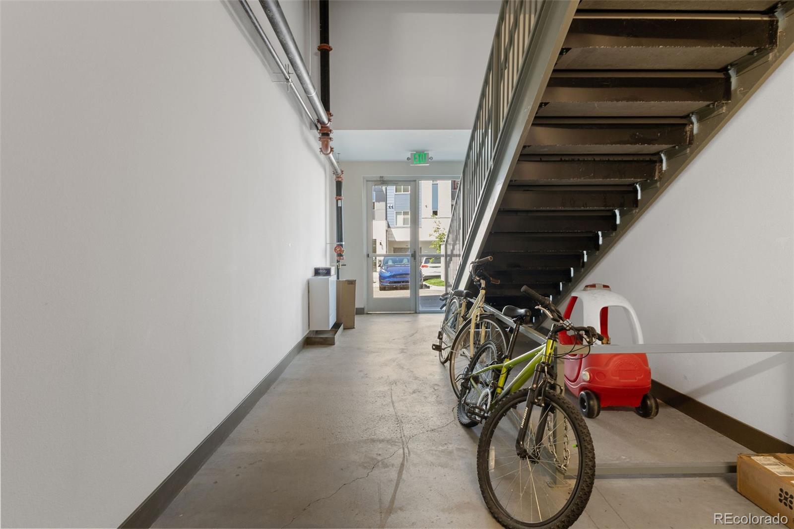 9287 Twenty Mile Road, Unit 401 Parker, CO 80134 - Photo 38 of 44 a view of an entryway with wooden floor