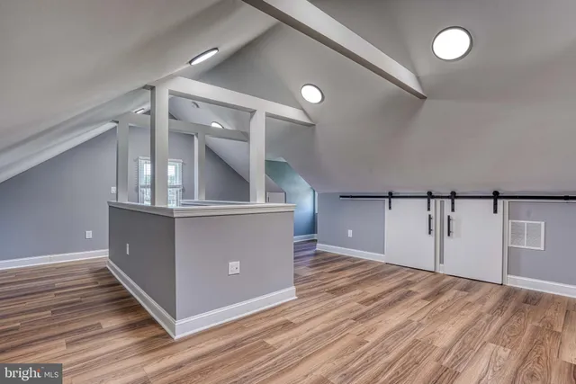 a view of a house with backyard and porch