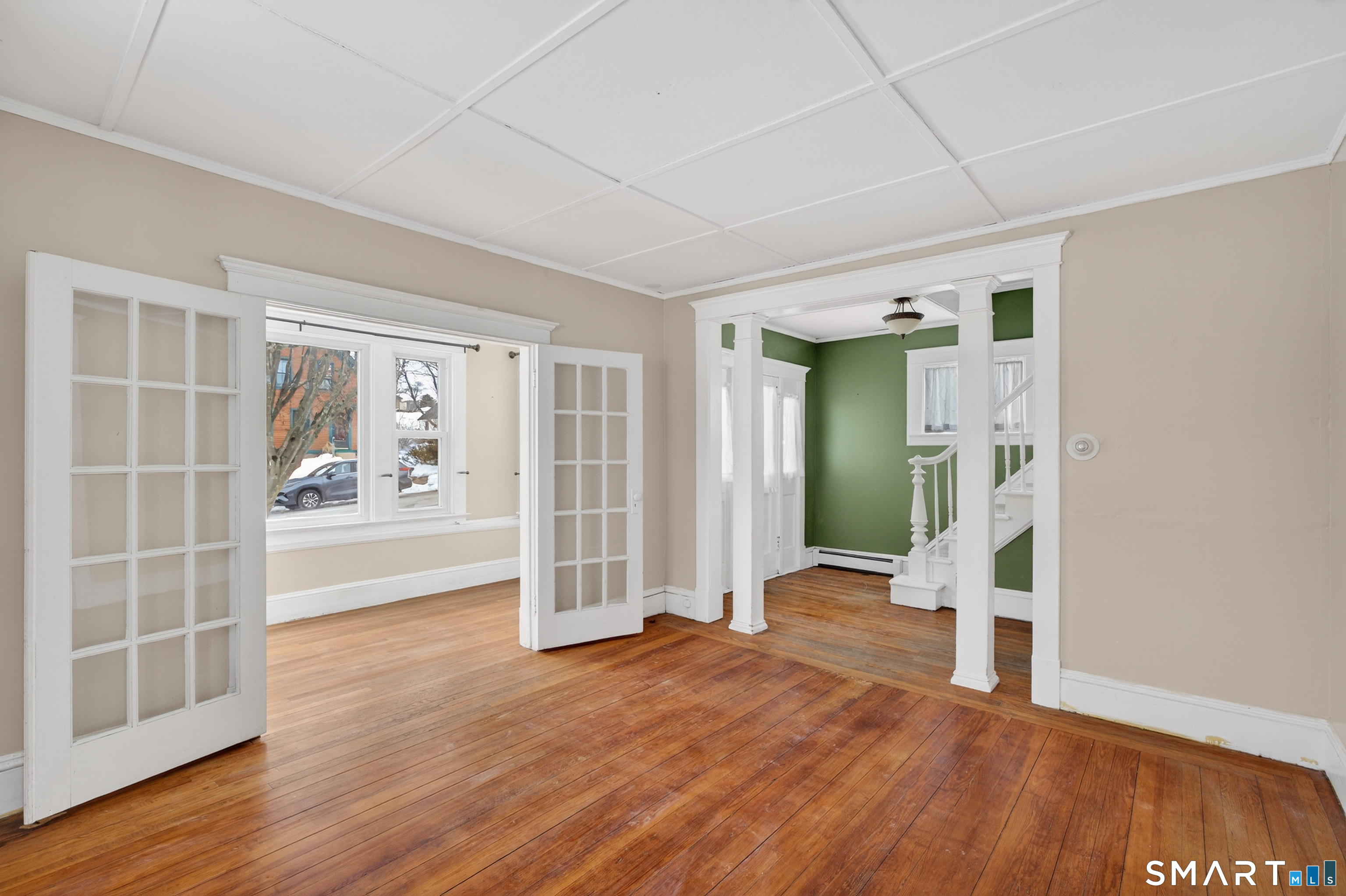 85 Baker Avenue Groton, CT 06340 - Photo 12 of 36 French doors to the sunroom