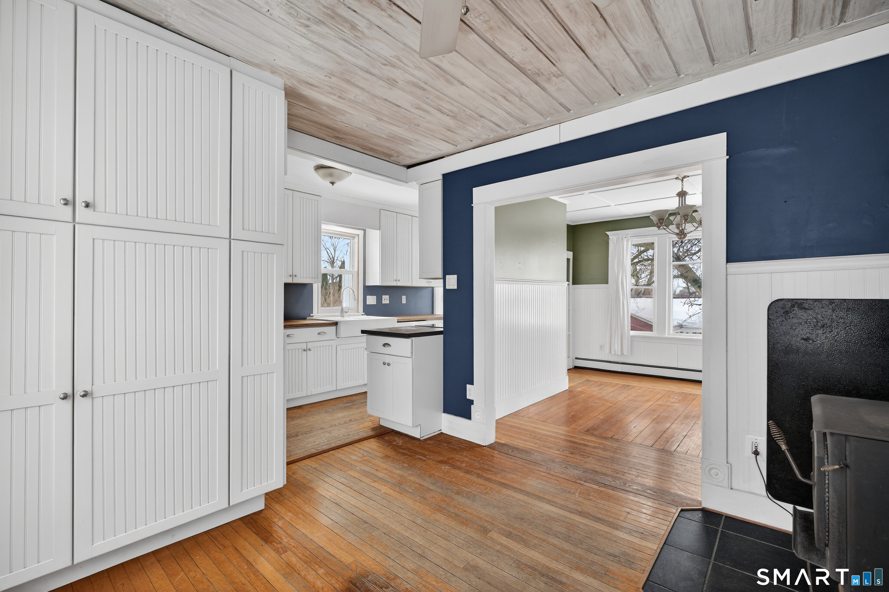 85 Baker Avenue Groton, CT 06340 - Photo 17 of 36 Looking towards built-in cabinetry and kitchen area