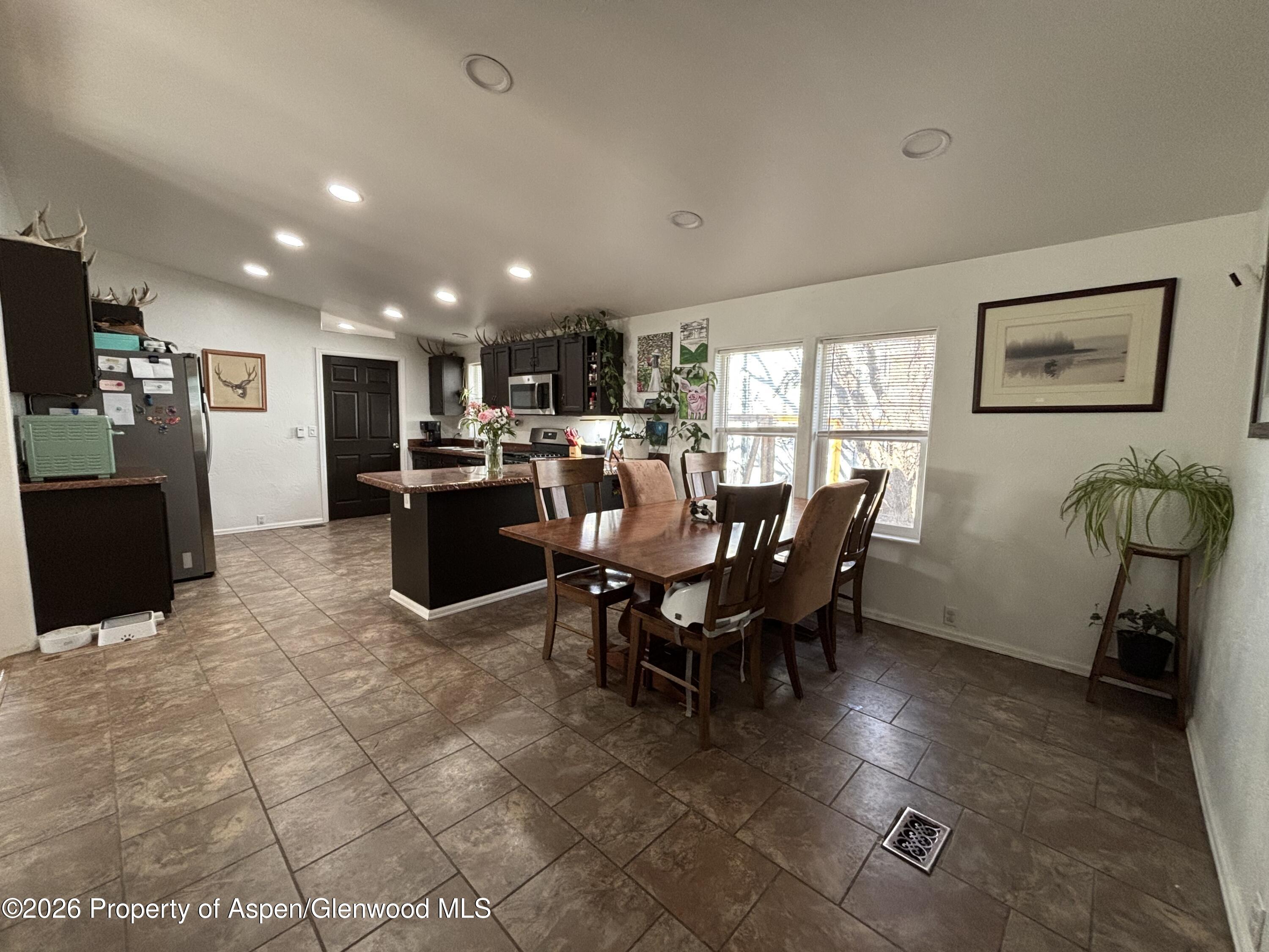 106 Cedar Circle Parachute, CO 81635 - Photo 8 of 35 a view of a dining room with furniture