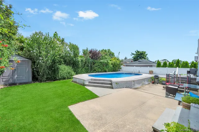 a view of a terrace with sitting area