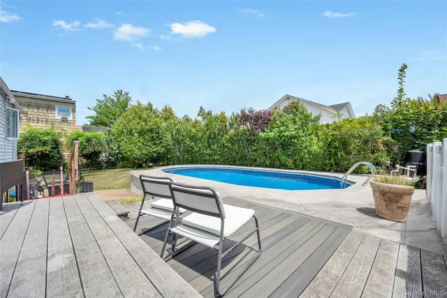 a view of a chairs and table on the terrace