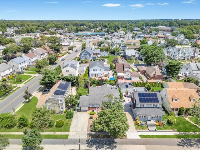 an aerial view of a house with a outdoor space