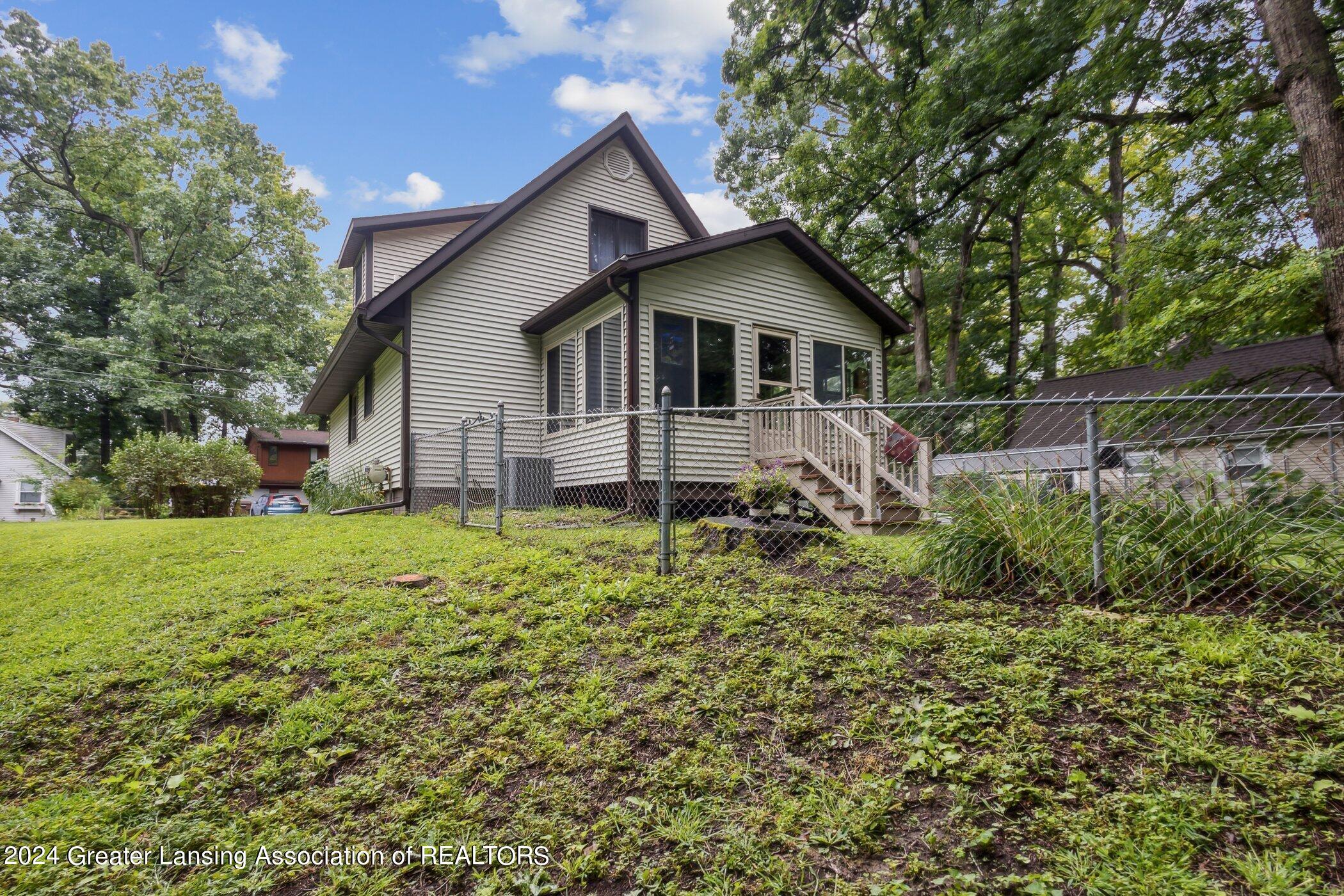 6291 Ridge Street Haslett, MI 48840 - Photo 27 of 31 Exterior Rear