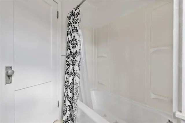 a bathroom with a bathtub