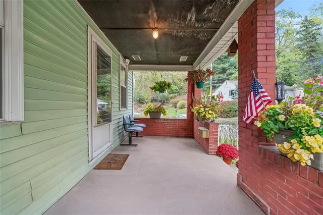 a view of a porch with furniture