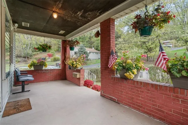 a outdoor living space with furniture and garden view