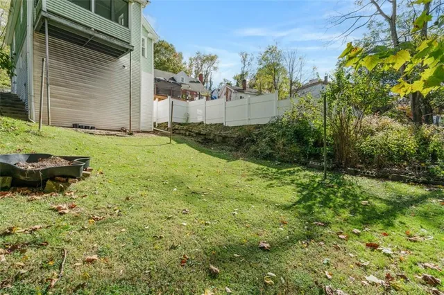 a view of backyard with outdoor space