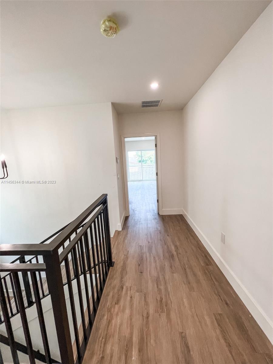 Collier City Pompano Beach, FL 33069 - Photo 14 of 28 a view of a hallway