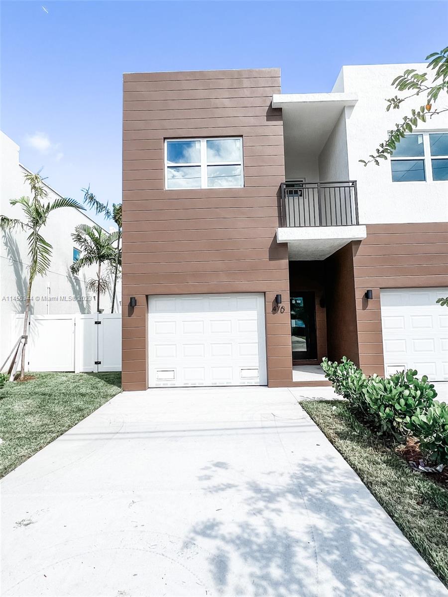 Collier City Pompano Beach, FL 33069 - Photo 2 of 28 a bathroom with a sink and a mirror